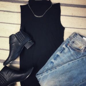 Black sleeveless tank top with turtle neck